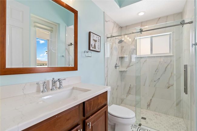 Pool bath, door to lanai not shown. | Image 20