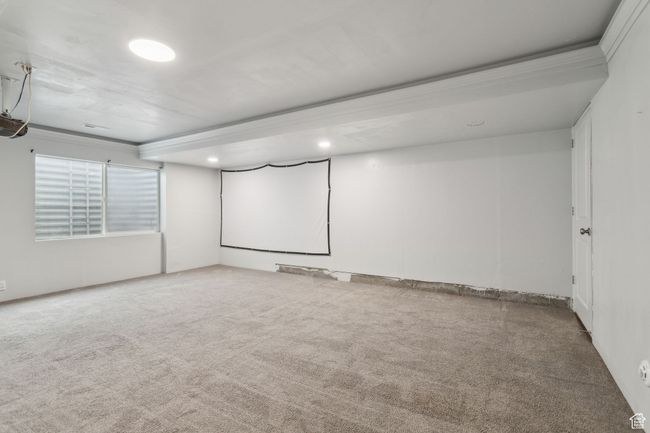 The fully finished basement features a secondary primary (4th bedroom) with 3/4 bathroom. Which would also make for a great family room with included projector. | Image 25