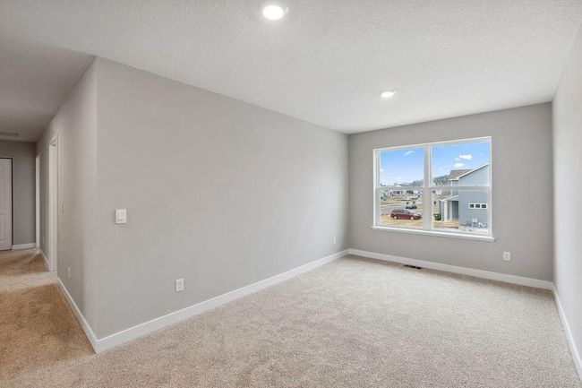 The upper level loft is a great space to unwind, read books or watch TV. Model photos. Options and colors will vary. | Image 25