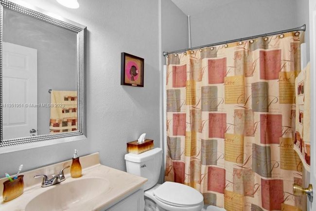 5806 Nw Breezy Brook Ct, House other with 3 bedrooms, 2 bathrooms and null parking in Port St. Lucie FL | Image 25