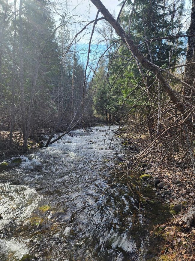 74 Cedar Creek Ext, Libby Montana 59923 Two parcels with 750+/_ Riverfront has a 26640 sqft 3/2 with shop & carport. | Image 32