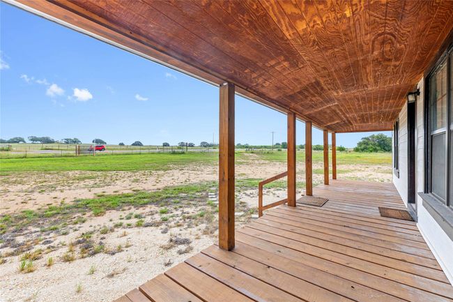 Deck featuring a view of rural / pastoral area | Image 7