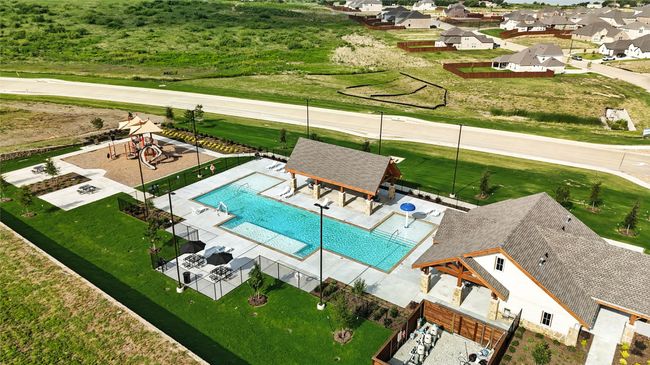 Aerial perspective of suburban area featuring a pool area | Image 24