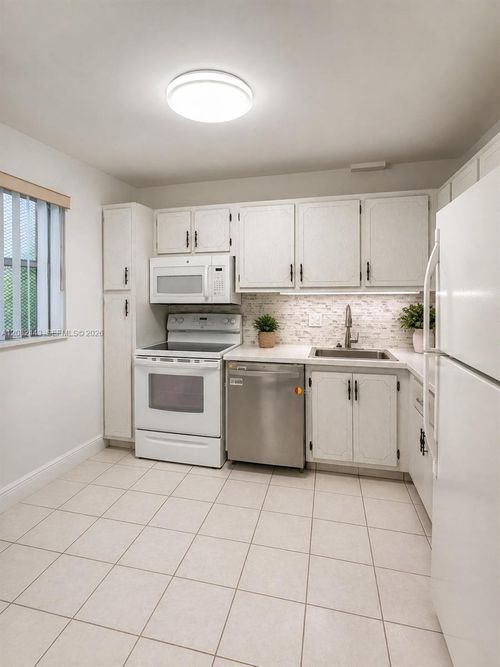 e309-8350 Sands Point Blvd, Tamarac, FL, 33321-3835 | Card Image