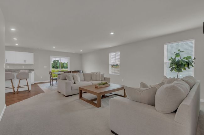 An expansive and inviting living area. | Image 12