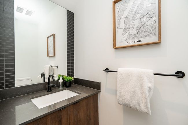Bathroom with vanity and toilet | Image 14