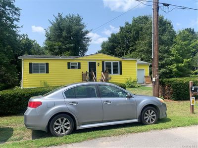 View of front of home with a front lawn | Image 3