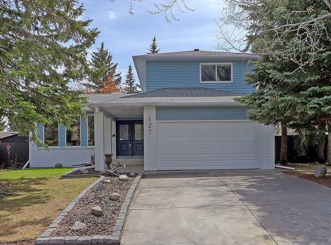 127 Silver Ridge Close Nw, Home with 4 bedrooms, 3 bathrooms and 4 parking in Calgary AB | Image 1
