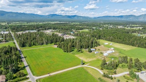 1995 Conn Rd, Columbia Falls, MT, 59912-9013 | Card Image