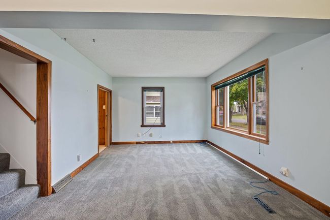 The stair way on the left goes up to a bedroom. | Image 7
