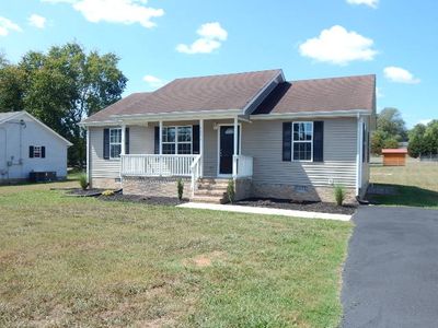 Maintenance free exterior and asphalt drive that has had new sealant. | Image 2