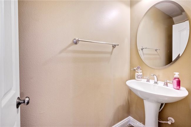 Conveniently located main level powder room | Image 14