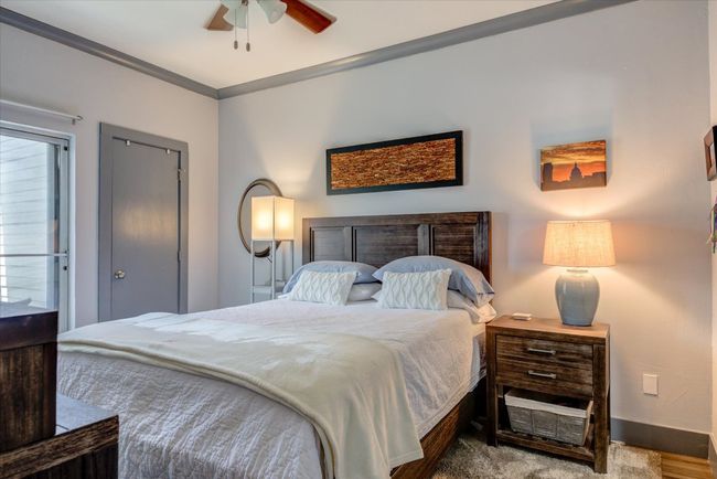 Bedroom featuring baseboards and ceiling fan | Image 9