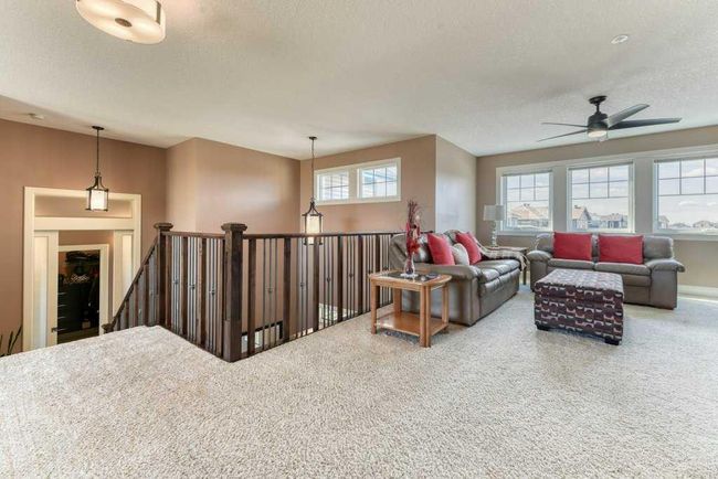 312 Boulder Creek Cres Se, House other with 3 bedrooms, 3 bathrooms and 6 parking in Langdon AB | Image 22