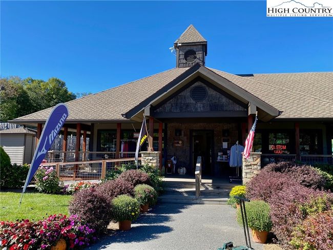 The Sugar Mountain clubhouse is home to both tennis and golf pro shops and a grill providing summer "grill and chill" dinners with live music. | Image 45