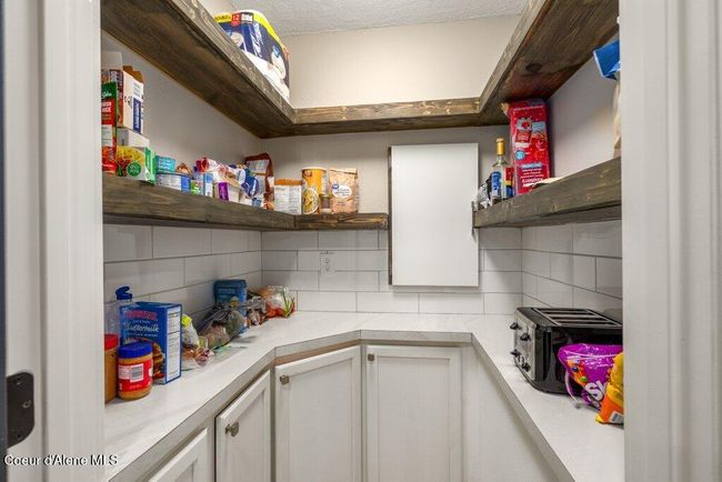 Plus, a walk in pantry with cabinets and shelving! | Image 13