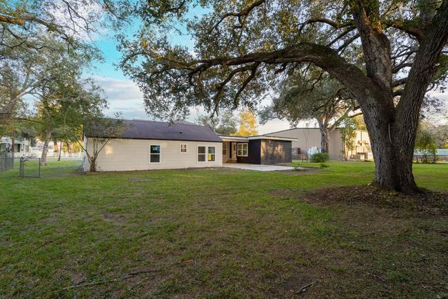Sitting on just over half an acre, this lot offers plenty of space to design and create your own dream backyard, providing endless possibilities for outdoor living and entertainment. | Image 38