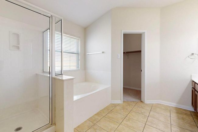 Separate tub and walk in shower. Window at tub is fogged glass so you get the privacy and the natural light too. | Image 13