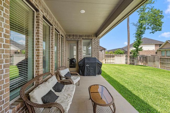 Relaxing covered patio allows you to enjoy the outdoors. | Image 45