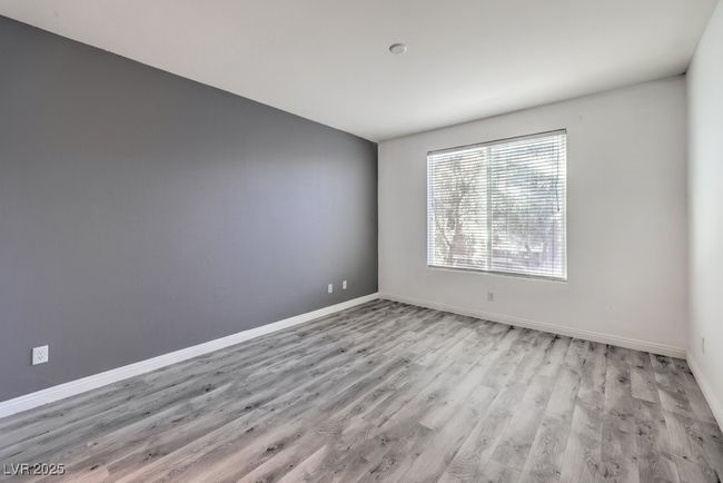 Spare room featuring light wood finished floors and baseboards | Image 20