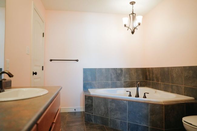 822 28 St, Home with 3 bedrooms, 3 bathrooms and 3 parking in Wainwright AB | Image 45