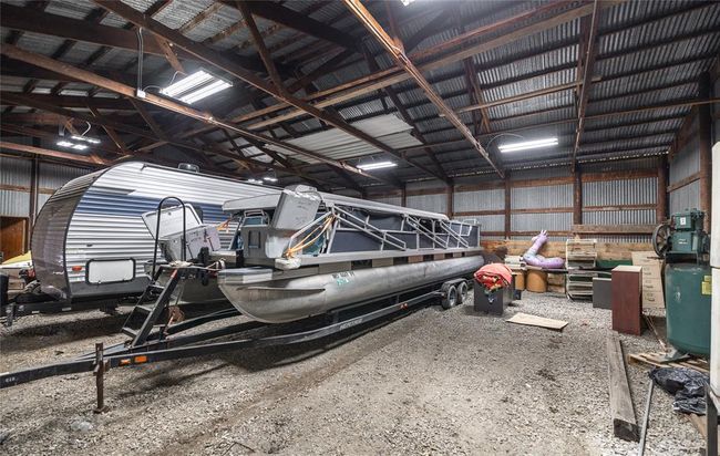 Garage with metal wall | Image 11