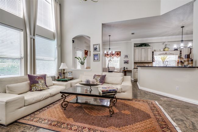 Family room is conveniently located next to kitchen and breakfast room providing a great flow for entertaining. | Image 11