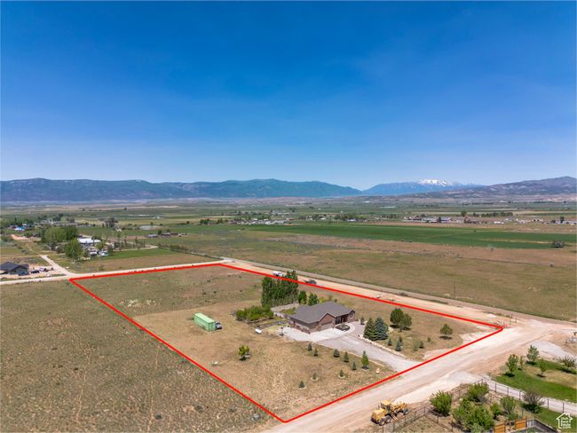 View of rural area with property boundaries highlighted and a mountain backdrop | Image 44