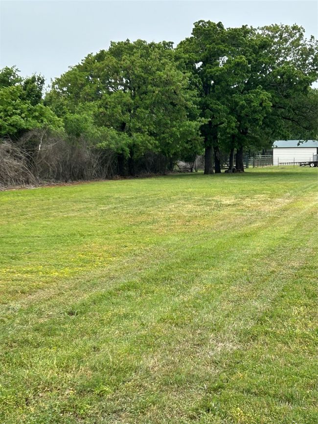 View of yard featuring fence | Image 23