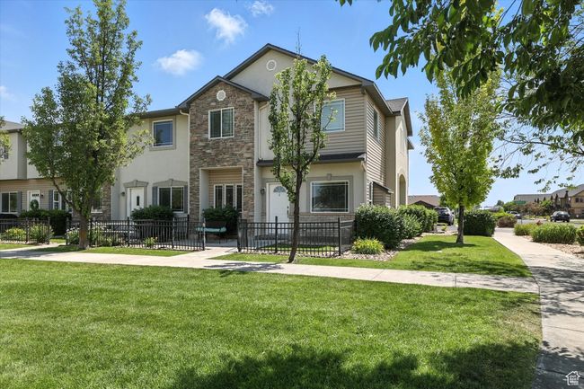 View of front of property featuring stone siding and stucco siding | Image 30