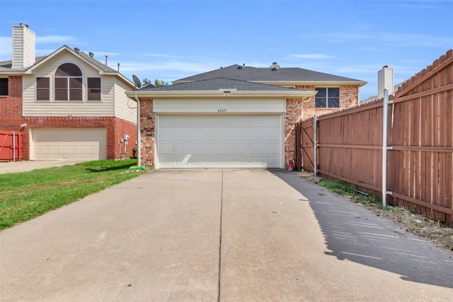 View of garage and driveway. | Image 28