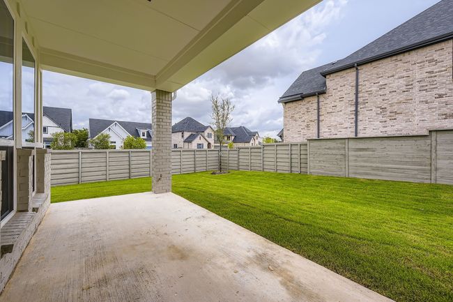 Fenced backyard featuring a patio and a residential view | Image 27