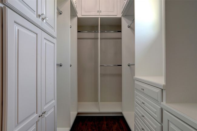 Primary bedroom. One Custom-built walk-in closet. The high ceilings continue throughout ... | Image 15