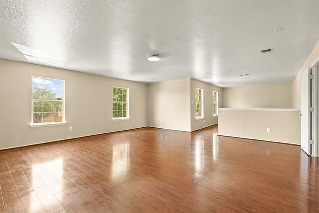 Primary Suite with Seating Area (upstairs) | Image 22