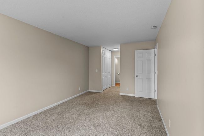 Closets on both sides of hall to bath | Image 16