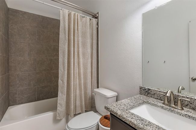 Secondary bathroom with huge tub. | Image 23