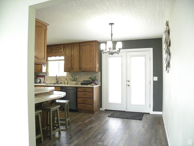 Dining Area: Doors open to a good-sized Deck. | Image 9