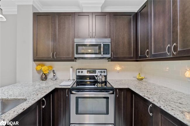 112 - 33 Whitmer St, House attached with 2 bedrooms, 2 bathrooms and 1 parking in Milton ON | Image 6