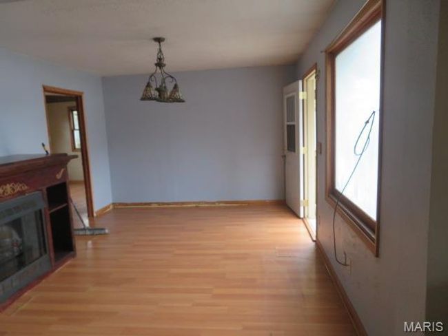 Dining area with light hardwood / wood-style flooring | Image 14