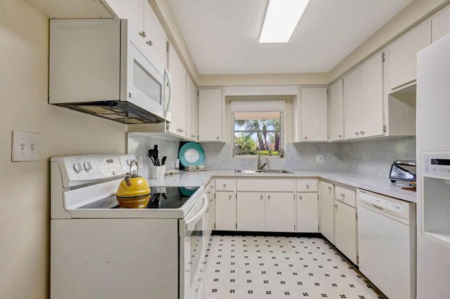 124 Sandal Ln, House other with 3 bedrooms, 2 bathrooms and null parking in Palm Beach Shores FL | Image 15