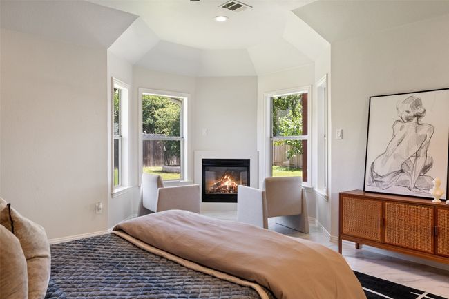 Bedroom featuring multiple windows | Image 21