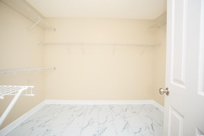 Primary bedroom walk-in closet | Image 23