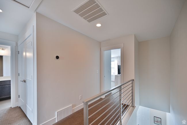 Corridor with an upstairs landing, recessed lighting, and baseboards | Image 26