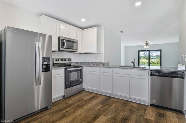 869 General Chesty Puller Ct, House other with 3 bedrooms, 2 bathrooms and 2 parking in LABELLE FL | Image 8