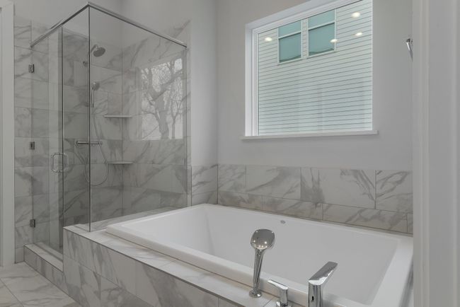 Full bathroom with a garden tub, marble finish floor, and a shower stall | Image 28