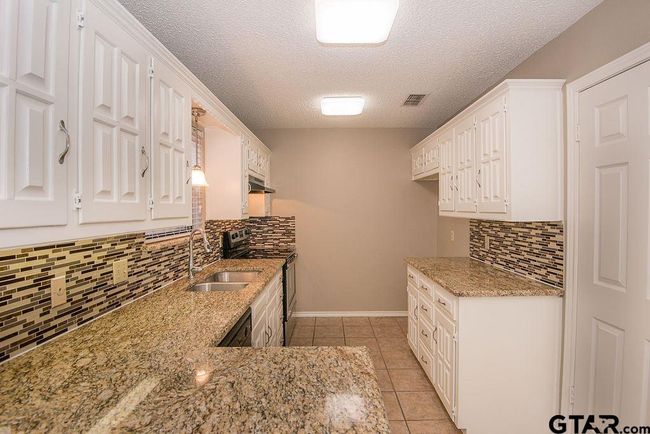 5907 Hollytree Dr, Townhouse with 2 bedrooms, 2 bathrooms and null parking in Tyler TX | Image 11