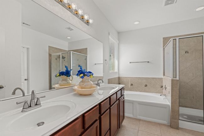 Two sinks, tub and shower, walk in closet | Image 13
