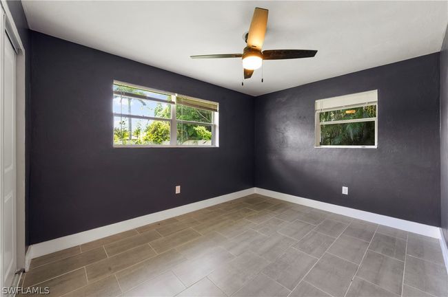 Tiled empty room with ceiling fan | Image 34