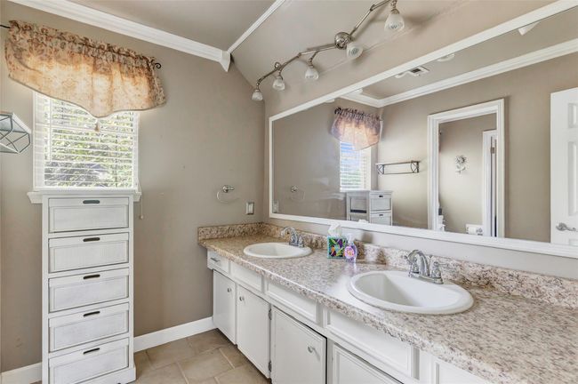 Upstairs bathroom with double sinks. | Image 32