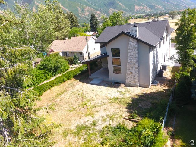 View of subject property with a mountain backdrop | Image 44